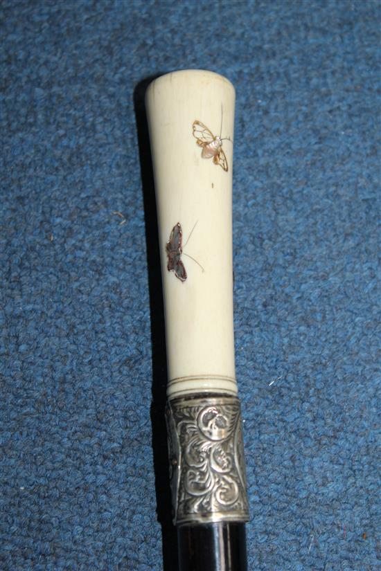 A late Victorian ebonised walking cane, 36in.